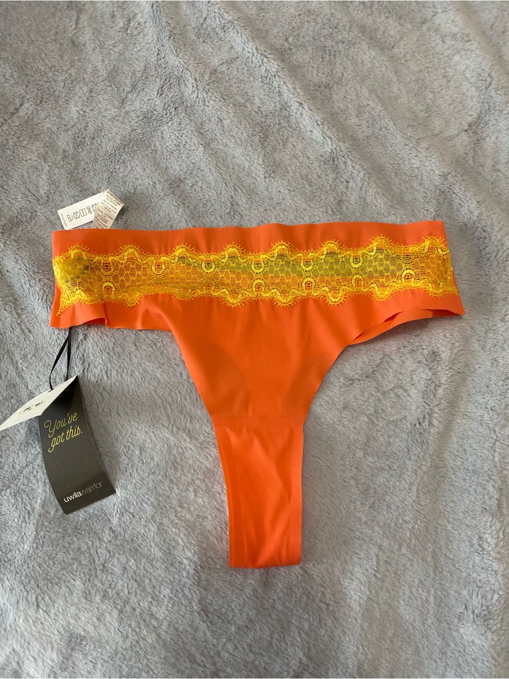 Uwila Warrior orange seamless thong with lace detail